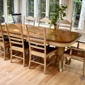 F16. Double pedestal table with 8 chairs and 2 leaves. 30"h x 42"w x 66"l 